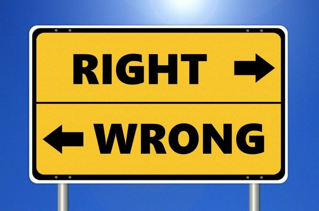 Sign that says "Right" with an arrow to the right and "Wrong" with an arrow to the left